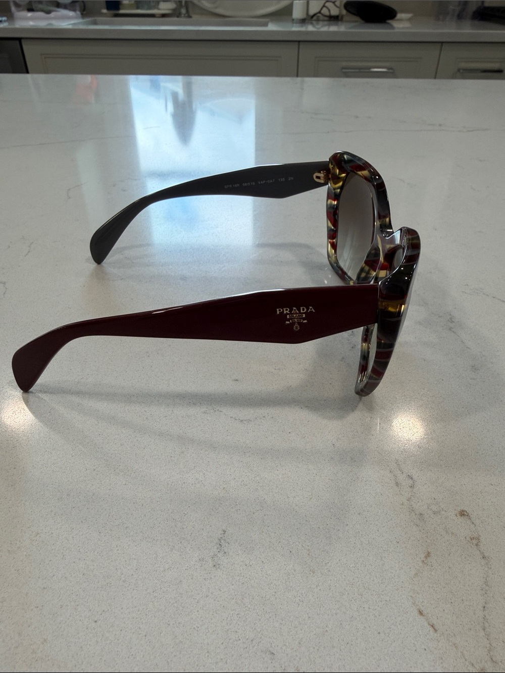 Prada Women’s Tortoise Frame with Burgundy Temples Sunglasses